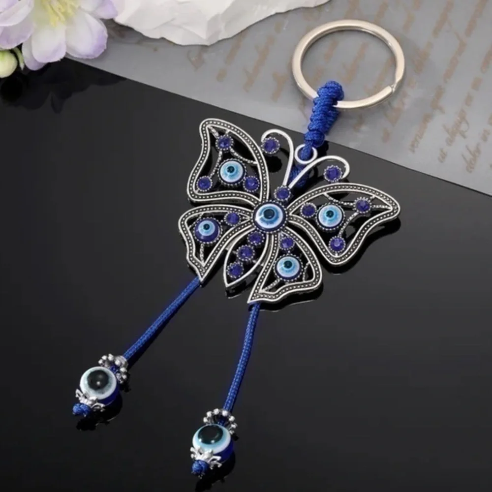 NEW Butterfly Blue & Silver Rope Good Luck Charm Bead Tassel Evil Eye Keychain